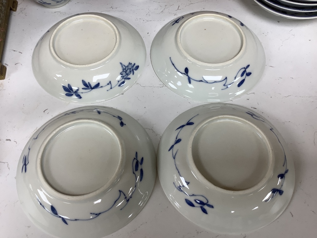 Five Chinese blue and white 'birds' tea bowls and four saucers and three 'chicken' tea bowls and four saucers (16)